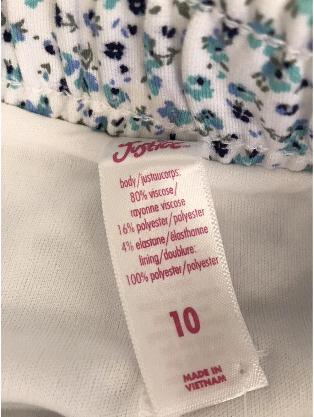 Justice Girls Skort. White With Blue & Green Flowers. White Shorts. Size 10. NWT